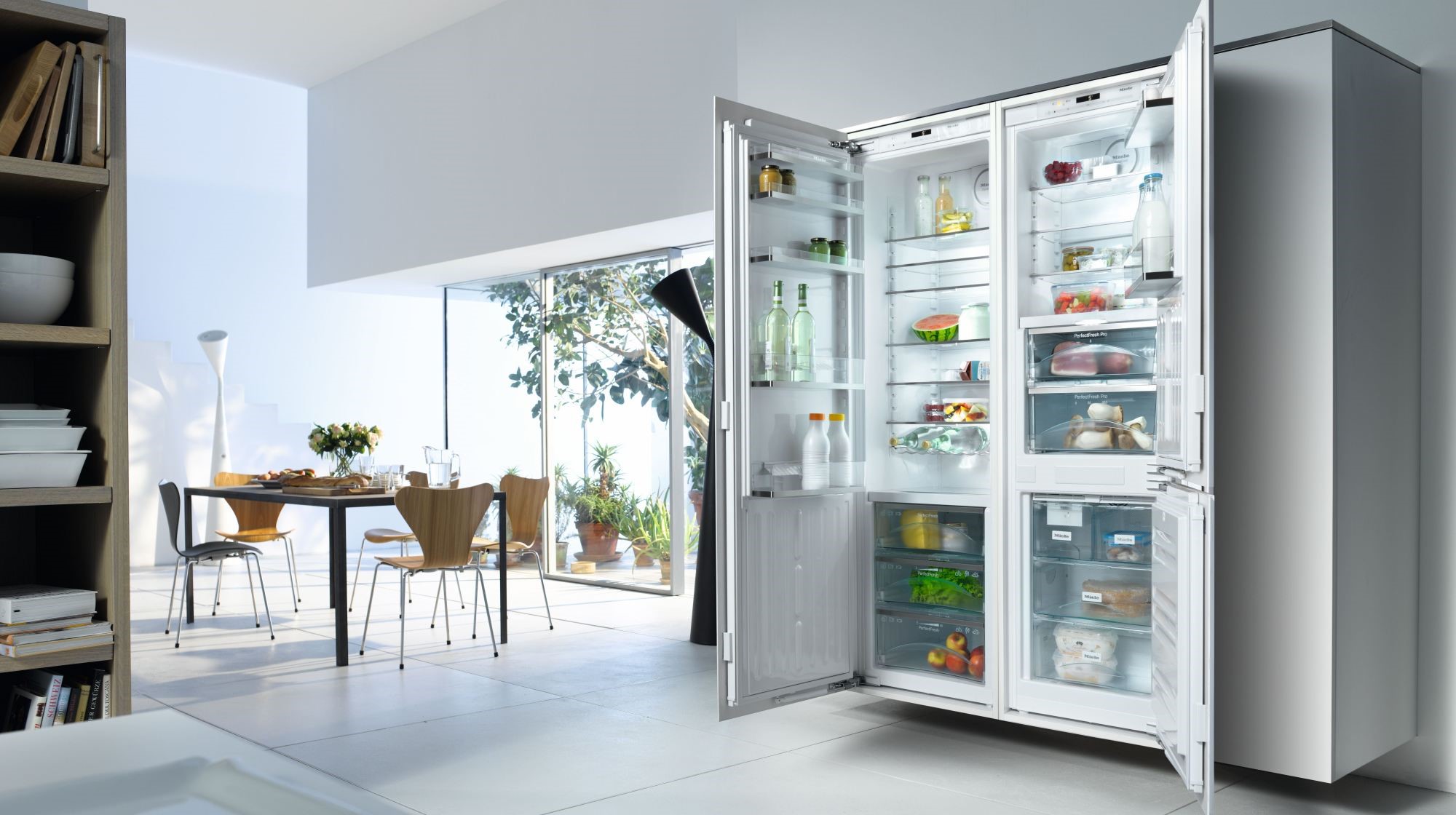 Miele side-by-side refrigeration, open, in a modern Kuwait kitchen